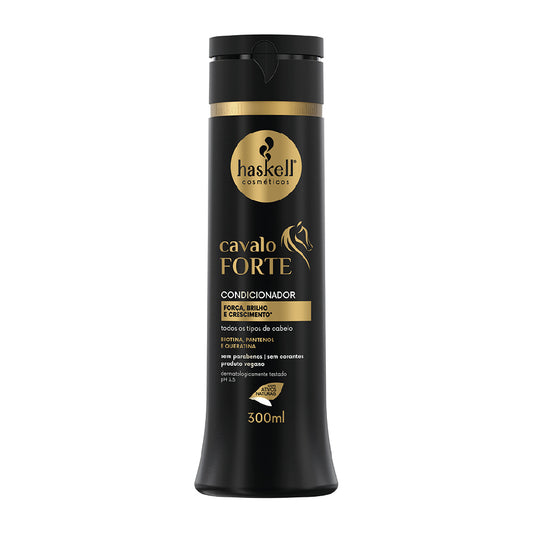 Black hair conditioner bottle with gold text and Haskell logo on a white background